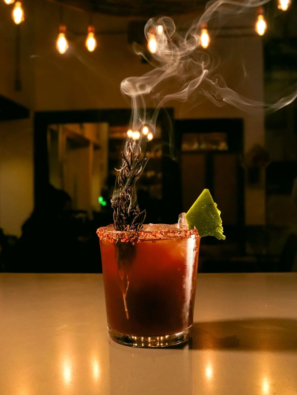 A smoked mezcal drink on the bar