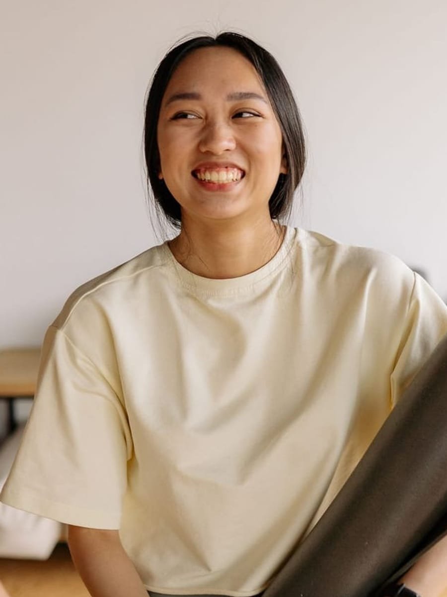 Grace Tanaka laughing with students before class