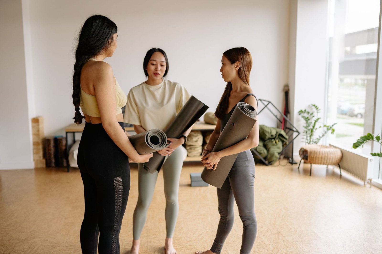 Grace Tanaka showing two new students around before class
